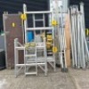 1 X YOUNGMAN BOSS 3T INDUSTRIAL SCAFFOLD TOWER TO INCLUDE 10 X MEDIUM SIZE BEAMS ( RED CLIPS ) 7 X LARGE BEAMS ( BLUE CLIP ) 4 X SUPPORT LEGS / 2 X WOODEN PLATFORMS / 2 X SIDE WALLS WITH LADDER AND 2 X WITHOUT 2 X SMALL SIDE WALLS - 1 WITH LADDER 4 X