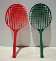 150 X BRAND NEW KIDS PLASTIC TENNIS RACKET IN RED AND GREEN IN HALF A PALLET BOX