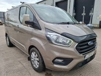 SILVER FORD TRANSIT CUSTOM 300, REG: L29FLY, 1995cc, DATE OF 1ST REGISTRATION 31/12/2019, 1 KEY, NO V5, MOT EXPIRED 30/12/2024, 69917 MILES, AIR CON, CRUISE CONTROL. 2 VAN VAULTS IN THE REAR.