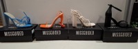 20 X BRAND NEW PAIRS OF ASSORTED MISSGUIDED WOMENS SHOES CONTAINING BLOCK HEEL TIE UP SANDALS IN CREAM , SQUARE TOE TIE UP HEELED SANDALS IN ORANGE , WIDE FIT HIGH HEEL BLOCK BARELY THERE IN BLACK , STRAPPY RING DETAIL HEELED SANDAL IN BLUE ETC ALL IN SI