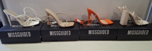 20 X BRAND NEW PAIRS OF ASSORTED MISSGUIDED WOMENS SHOES CONTAINING STRAPPY RING DETAIL HEELED SANDAL IN WHITE , SQUARE TOE PATENT HEELED SANDAL IN SAND , BLOCK HEEL TIE UP HEELED SANDALS IN CREAM , SQUARE TOE TIE UP HEELED SANDALS IN ORANGE ETC ALL IN SI