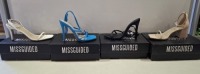 20 X BRAND NEW PAIRS OF ASSORTED MISSGUIDED WOMENS SHOES CONTAINING BARELY THERE LOW HEEL SANDALS IN WHITE , STRAPPY RING DETAIL HEELED SANDAL IN BLUE , POINTED TOE LACE UP BARELY THERE SATIN IN BLACK , MID HEEL BLOCK BARELY THERE IN SAND ETC IN MIXED SIZ