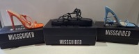 20 X BRAND NEW PAIRS OF ASSORTED MISSGUIDED WOMENS SHOES CONTAINING ASSYM STRAPPY HEELED SANDALS IN ORANGE , SQUARE TOE TIE UP HEELED SANDALS IN BLUE , CHUNKY FLATFORM GLADIATOR SANDAL IN BLACK ETC INMIXED SIZES 3 AND 5 (NOTE - SOME HAVE SECURITY TAGS)