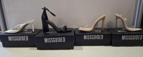 20 X BRAND NEW PAIRS OF ASSORTED MISSGUIDED WOMENS SHOES CONTAINING POINTED TOE PERSPEX STILETTO IN NUDE , SQUARE TOE PERSPEX HIGH HEEL MULES IN SAND , BARELY THERE LOW HEEL SANDALS IN WHITE , WIDE FIT HIGH HEEL BLOCK BARELY THERE IN BLACK ETC IN SIZE 5 A