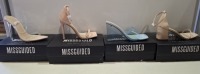 20 X BRAND NEW PAIRS OF ASSORTED MISSGUIDED WOMENS SHOES CONTAINING POINTED TOE PERSPEX STILETTO IN NUDE , SQUARE TOE PATENT HEELED SANDAL IN SAND , PERSPEX SQUARE TOE WEDGE HEEL IN BLUE , MID HEEL BLOCK BARELY THERE IN SAND ETC IN MIXED SIZES 6 AND 7 (N
