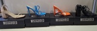 20 X BRAND NEW PAIRS OF ASSORTED MISSGUIDED WOMENS SHOES CONTAINING STRAPPY RING DETAIL HEELED SANDAL IN BLUE , BLOCK HEEL TIE UP SANDALS IN BLACK , MID HEEL BLOCK BARELY THERE IN SAND , SQUARE TOE TIE UP HEELED SANDALS IN ORANGE ETC IN MIXED SIZES 6 AND 