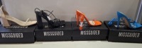 20 X BRAND NEW PAIRS OF ASSORTED MISSGUIDED WOMENS SHOES CONTAINING BASIC BARELY THERE IN BLACK , SQUARE TOE TIE UP HEELED SANDALS IN ORANGE , STRAPPY RING DETAIL HEELED SANDAL IN BLUE , MID HEEL BLOCK BARELY THERE IN SAND ETC IN MIXED SIZES 6 AND 8 (NO