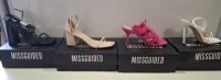 20 X BRAND NEW PAIRS OF ASSORTED MISSGUIDED WOMENS SHOES CONTAINING STRAPPY RING DETAIL HEELED SANDAL IN WHITE , CROCHET TIE UP HEELED SANDAL IN HOT PINK , BLOCK HEEL TIE UP SANDALS IN BLACK , MID HEEL BLOCK BARELY THERE IN SAND ETC IN MIXED SIZES 6 AND 7