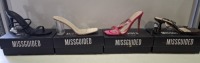 20 X BRAND NEW PAIRS OF ASSORTED MISSGUIDED WOMENS SHOES CONTAINING SATIN BARELY THERE HIGH HEEL IN PINK , SQUARE TOE STRAPPY TIE UP MID HEEL IN CHOCOLATE , WIDE FIT MID CLEAR HEEL BLOCK IN NUDE , BASIC BARELY THERE IN BLACK ETCIN MIXED SIZES 6 AND 7 (NO