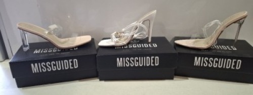 20 X BRAND NEW PAIRS OF ASSORTED MISSGUIDED WOMENS SHOES CONTAINING STRAPPY RING DETAIL HEELED SANDALS IN WHITE , WIDE FIT MID CLEAR HEEL BLOCK SHOE IN NUDE , POINTED TOE PERSPEX STILETTO IN NUDE , WF MID ILLUSION HEEL CLEAR SANDALS IN NUDE ETC IN MIXED S