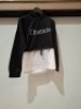 40 X BRAND NEW CLOTHING LOT CONTAINING SIKIR SIKIR COLLECTION HOODIES ALL IN WHITE AND BLACK IN MIXED SIZES IE S , M , L , XL IN ONE BOX