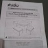 1 X STUDIO SEVILLE CORNER RATTAN UP AND DOWN SOFA SET LOT CONTAINING SOFA SIZE 192 X 192 X 79CM AND STOOLS IN SIZE 40 X 80 X 42 CM AND TABLE IN SIZE 100 X100 X50/70CM IN BLACK / GREY IN TWO BOXES (NOTE CUSTOMER RETURNS )