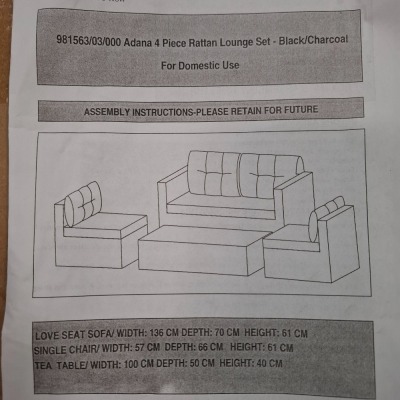 1 X STUDIO ADANA 4 PIECE RATTAN LOUNGE SET IN BLACK / CHARCOAL LOT CONTAINING LOVE SEAT SOFA IN SIZE W 136 X D 70 X H 61 AND SINGLE CHAIRS IN SIZE W 57 X D 66 X H 61 AND TEA TABLE IN SIZE W 100 X D 50 X H 40 IN ONE BOX (NOTE CUSTOMER RETURNS UNDELIVERED G