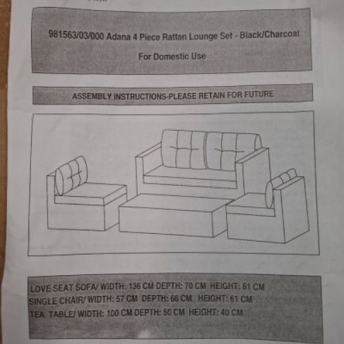1 X STUDIO ADANA 4 PIECE RATTAN LOUNGE SET IN BLACK / CHARCOAL LOT CONTAINING LOVE SEAT SOFA IN SIZE W 136 X D 70 X H 61 AND SINGLE CHAIRS IN SIZE W 57 X D 66 X H 61 AND TEA TABLE IN SIZE W 100 X D 50 X H 40 IN ONE BOX (NOTE CUSTOMER RETURNS UNDELIVERED G