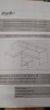 1 X STUDIO KAUAI CORNER SET RATTAN CHAISE IN BLACK / GREY LOT CONTAINING LOVE SEAT IN SIZE W 123 X D 64 X H 67 AND CHAISE IN SIZE W 64 X D 123 X H 67 AND TABLE IN SIZE 45 X D 45 X H34 CM IN ONE BOX ((NOTE DAMAGED BOX / CUSTOMER RETURNS)