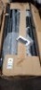 1 X STUDIO KAUAI CORNER SET RATTAN CHAISE IN BLACK / GREY LOT CONTAINING LOVE SEAT IN SIZE W 123 X D 64 X H 67 AND CHAISE IN SIZE W 64 X D 123 X H 67 AND TABLE IN SIZE 45 X D 45 X H34 CM IN ONE BOX ((NOTE DAMAGED BOX / CUSTOMER RETURNS) - 2