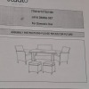 1 X STUDIO JAVA DINING SET IN GREY LOT CONTAINING ONE LOVESEAT IN SIZE 104 X D 59 X 81 , 2 CHAIRS IN SIZE W 58 X D 59 X 81 CM , 2 FOOT STOOLS IN SIZE W 37 X D37 X H37 AND ONE TABLE IN SIZE W100 X D 60 X HIGHT IN TWO BOXES (NOTE CUSTOMER RETURNS UNDELIVERE