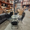 1 X STUDIO OXFORD 6 PIECE PATIO SET IN BLACK LOT CONTAINING 4 FOLDING CHAIRS IN SIZE 53 X 55 X 85 , ONE TABLE IN SIZE DIAM 80 X X 70 CM AND ONE UMBRELLA IN SIZE 180CM (NOTE CUSTOMER RETURNS UNDELIVERED GOODS)