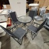 1 X STUDIO OXFORD 5 PIECE PATIO SET IN BLACK CONTAINING ONE SMALL TABLE IN SIZE 60 X 71 AND 4 FOLDING CHAIRS