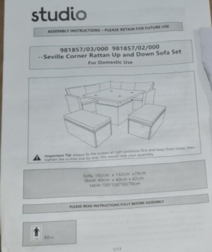 1 X STUDIO SEVILLE CORNER RATTAN UP AND DOWN SOFA SET LOT CONTAINING SOFA SIZE 192 X 192 X 79CM AND STOOLS IN SIZE 40 X 80 X 42 CM AND TABLE IN SIZE 100 X 100 X 50/70CM IN BLACK / GREY IN TWO BOXES (NOTE CUSTOMER RETURNS )