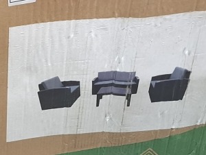 1 X CULCITA MALIBU LOUNGE SET IN BLACK CONTAINING 2 SEATER CHAIR AND 2 SINGLE CHAIRS AND ONE TABLE IN ONE LARGE BOX (NOTE DAMAGED BOX / CUSTOMER RETURNS )