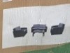 1 X CULCITA MALIBU LOUNGE SET IN BLACK CONTAINING 2 SEATER CHAIR AND 2 SINGLE CHAIRS AND ONE TABLE IN ONE LARGE BOX (NOTE DAMAGED BOX / CUSTOMER RETURNS )