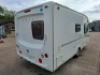 SWIFT FREESTYLE 460 TWO-BERTH TOURING CARAVAN YOM: 2009, ALL KEYS & FOBS, SINGLE AXLE. TOTAL AREA 14 M/2. REAR BATHROOM WITH SEPARATE SHOWER, MOTOR MOVER WITH REMOTE, BLOWN AIR HEATING SYSTEM, KITCHEN AREA WITH SINK, GAS HOB & COOKER, FRIDGE FREEZER, SANY - 3