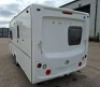 SWIFT FREESTYLE 460 TWO-BERTH TOURING CARAVAN YOM: 2009, ALL KEYS & FOBS, SINGLE AXLE. TOTAL AREA 14 M/2. REAR BATHROOM WITH SEPARATE SHOWER, MOTOR MOVER WITH REMOTE, BLOWN AIR HEATING SYSTEM, KITCHEN AREA WITH SINK, GAS HOB & COOKER, FRIDGE FREEZER, SANY - 4