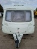 SWIFT FREESTYLE 460 TWO-BERTH TOURING CARAVAN YOM: 2009, ALL KEYS & FOBS, SINGLE AXLE. TOTAL AREA 14 M/2. REAR BATHROOM WITH SEPARATE SHOWER, MOTOR MOVER WITH REMOTE, BLOWN AIR HEATING SYSTEM, KITCHEN AREA WITH SINK, GAS HOB & COOKER, FRIDGE FREEZER, SANY - 5