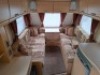 SWIFT FREESTYLE 460 TWO-BERTH TOURING CARAVAN YOM: 2009, ALL KEYS & FOBS, SINGLE AXLE. TOTAL AREA 14 M/2. REAR BATHROOM WITH SEPARATE SHOWER, MOTOR MOVER WITH REMOTE, BLOWN AIR HEATING SYSTEM, KITCHEN AREA WITH SINK, GAS HOB & COOKER, FRIDGE FREEZER, SANY - 14