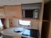 SWIFT FREESTYLE 460 TWO-BERTH TOURING CARAVAN YOM: 2009, ALL KEYS & FOBS, SINGLE AXLE. TOTAL AREA 14 M/2. REAR BATHROOM WITH SEPARATE SHOWER, MOTOR MOVER WITH REMOTE, BLOWN AIR HEATING SYSTEM, KITCHEN AREA WITH SINK, GAS HOB & COOKER, FRIDGE FREEZER, SANY - 16