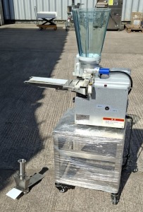 STAINLESS STEEL AUTOMATIC JAPANESE GYOZA DUMPLING MAKING MACHINE ON A PORTABLE STAND AND AN ATTACHMENT