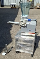STAINLESS STEEL AUTOMATIC JAPANESE GYOZA DUMPLING MAKING MACHINE ON A PORTABLE STAND AND AN ATTACHMENT