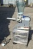 STAINLESS STEEL AUTOMATIC JAPANESE GYOZA DUMPLING MAKING MACHINE ON A PORTABLE STAND AND AN ATTACHMENT