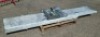 STAINLESS STEEL ROLLER CONVEYOR ASSEMBLY (BRAND NEW STILL WRAPPED) CONSISTING - 3M X 0.5M ROLLER BED 2M X 0.5M ROLLER BED 2 X 0.6M HIGH BED SUPPORTS 4 X 0.28M LONG SUPPORT EXTENDERS