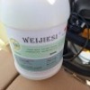 BRAND NEW WEIJIESI XDI-3 WALK BEHIND AUTO FLOOR SCRUBBER, SPARE SCRUBBING HEAD, 2 BOTTLES OF CLEANING SOLUTION PLUS A TITAN VACUUM CLEANER - 5