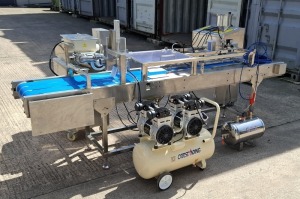 STAINLESS STEEL PNEUMATIC FILLING MACHINE / AUTOMATIC FOOD DEPOSITING MACHINE WITH BELT & FILLING CONTROLLERS WITH KEYS, OUTSTANDING COMPRESSOR AND SHENDE AIR CYLINDER (EXCEPTIONALLY CLEAN)