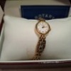 4 X LADIES WATCHES TO INCLUDE 1 X ROTARY OVA; GOLD PLATED BRACELET WATCH, 1 X MOTHER OF PEARL HEXAGONAL WATCH & 2 X OASIS MOTHER OF PEARL DIAMANTE LEATHER STRAP WATCH - 4