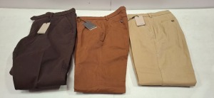 20 X BRAND NEW DAN JOHN TROUSERS LOT IN COLOURS LIGHT BROWN , BEIGE , DARK BROWN IN SIZES 54,56,60 ETC IN ONE TRAY (TRAYS NOT INCLUDED)