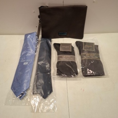 50+ BRAND NEW MIXED DAN JOHN CLOTHING LOT CONTAINING HIGH SOCKS IN BLACK , TIES IN NAVY ,BLACK AND LIGHT BLUE AND 1 BAG IN BROWN ETC IN ONE TRAY (NOTE - TRAY NOT INCLUDED)