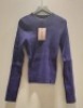 40 X BRAND NEW CLOTHING LOT CONTAINING MISSGUIDED BASIC CREW NECK LONG SLEEVE TOP IN PURPLE ALL IN SIZE SMALL IN TWO TRAYS (NOTE TRAYS NOT INCLUDED)