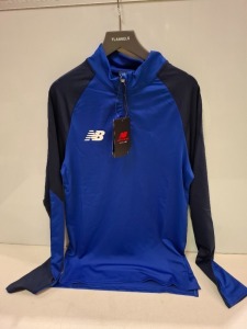25 X BRAND NEW KIDS NEW BALANCE QUARTER ZIPS TOPS IN BLUE IN SIZES YS AND YXL