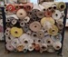APPROXIMATELY 50 PART ROLLS OF FABRIC IN VARIOUS SIZES AND COLOURS AND STYLES IN A FULL METAL CRATE ( STILLAGE NOT INCLUDED)
