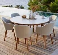 BRAND NEW 7 PC DINING SET - OUTDOOR OR INDOOR USE 1 X CANE - LINE ASPECT DINING TABLE IN TEAK WITH CERAMIC TOP - SIZE DIAM 144 CM , H 75 - RRP £4,400 (NOW WITH BOX) NOW WITH 6 MATCHING CHAIRS (IN 2 BOXES) RRP £330 EACH & 6 SETS OF SEAT COVERS £195 EACH 