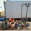 17 X GARDEN DECORATION LOT CONTAINING 2 METAL LAMP POSTS 8 VARIOUS PLANT POTS IN VARIOUS STYLES AND SIZES 3 PLANT SUPPORT BARS 4 GARDEN ORNAMENTS