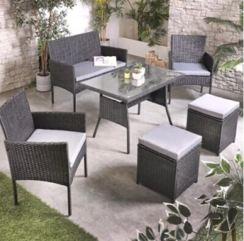 1 X STUDIO FIJI 6 PIECE DINING SET IN BLACK /GREY TO INCLUDE TABLE IN SIZE W 97 X D 62 X H 62 , LOVE SEAT IN SIZE W 101 X D 53 X H 81 , 2 FOOT STOOLS IN SIZE W 38 X D 38 X H 38 , 2 CHAIRS IN SIZE W 56 X D 53 X H 81CM IN TWO BOXES (NOTE CUSTOMER RETURNS )
