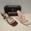 30 X BRAND NEW MIXED MISSGUIDED SHOES CONTAINING SQUARE TOE STRAPPY TIE UP MID HEELS IN CHOCOLATE , WF BARELY THERE SQUARE TOE HIGH HEELS IN NUDE , MID CLEAR HIGH BLOCK HEEL IN NUDE ETC ALL IN SIZE 7