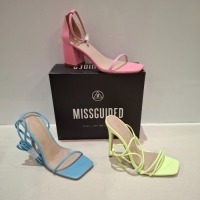 30 X BRAND NEW MIXED MISSGUIDED SHOES CONTAINING SQUARE TOE TIE UP HEELED SANDALS IN BLUE , MID BLOCKM HEEL BARELY THERE IN PINK , ASSYM STRAPPY HEELED SANDALS IN LIME ETC ALL IN SIZE 5