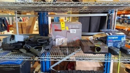 7 X MIXED LOT CONTAINING OLYMPUS CAMEDIA C-8080 WIDE ZOOM DIGITAL COMPACT CAMERA , TOSHIBA DLP PORTABLE PROJECTOR , COMB BINDING MACHINE , NOBO PORTBLE PROJECTOR ETC ON A FULL SHELF