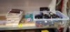 100 X BRAND NEW MIXED LOT CONTAINING SAMSUNG ANTI - REFLECTING SCREEN PROTECTORS , SHAMO'S MOBILE PHONE CASES , FULL TUB OF VARIOUS SUNGLASSES ETC